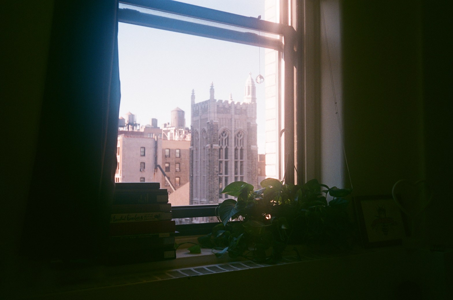 A film photo of a window in New York. The poet's old dorm room.